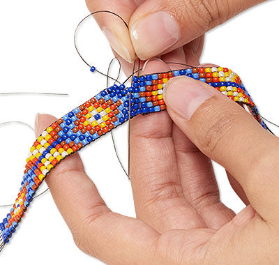 Beaded strips being sewn together